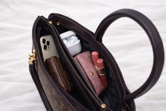 Elegant Brown Monogram Handbag With Gold Hardware
